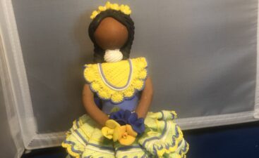 Handmade cloth doll in yellow and blue dress Handmade cloth doll in yellow and blue dress