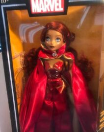 Marvel doll with red cape and dress